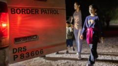 DEL RIO, TEXAS - MAY 19: A group of Venezuelan immigrants is taken into U.S. Border Patrol custody on May 19, 2021 in Del Rio, Texas. They had crossed the Rio Grande minutes earlier from Mexico to seek political asylum in the United States. (Photo by John Moore/Getty Images)