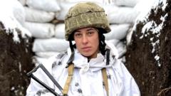 Maria is stationed on Ukraine's eastern front line. "We are standing our ground," she said.