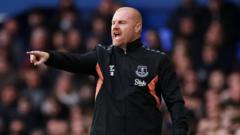 Dyche donates ‘lucky’ tracksuit for charity