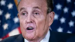 Getty Images Mr Trump's personal lawyer Rudy Giuliani repeated claims of voter fraud without providing evidence