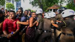 University students and police clash during a demonstration at colombo