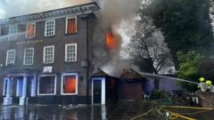 Historic London pub badly damaged in fire