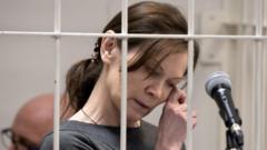 Елена Решетова по время последнего слова, в "клетке" на скамье подсудимых