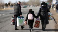 Ukrainian refugees leave the country