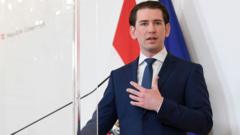 Austria's Chancellor Sebastian Kurz speaks at a doorstep prior to a cabinet meeting at the Chancellery in Vienna on May 12, 2021