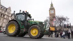 PA Media A tractor near Elizabeth Tower in central London