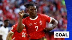 Embolo gives Switzerland lead