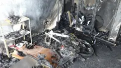 "They are essential" describes how smoke detectors are changing. 15 PA Media The charred remains of an e-bike lie in a charred room.