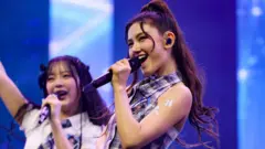 A K-pop band member sued for $30m after a record label feud. 13 Getty Images Danielle Marsh, a member of NewJeans