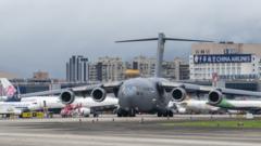 TAIPEI, TAIWAN - 2021/06/06: U.S. Air Force C-17 Globemaster III transport aircraft landed at Taipei Shongshan Airport. The United States will donate 750,000 COVID-19 vaccine doses to Taiwan as part of the countrys plan to share millions of jabs globally.