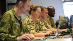 EUCOM Control Center – Ukraine / International Donor Coordination Centre staff members from the United Kingdom and United States, Patch Barracks, Germany, 3 June 2022