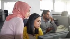 Office workers at computer