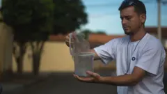 Getty Images A biologist in Brazil releases Oxitec to combat a Zika outbreak