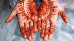 Girl displaying her Mehndi (henna) on occasion of Islamic festival of Eid-ul-Fitr
