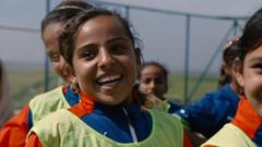 Girls playing football in Iraq