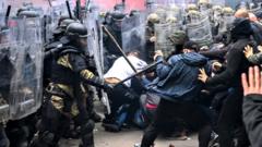 Nato peacekeeping troops clash with protesters in Zvecan, Kosovo