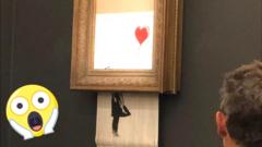 Shocked emoji face as Banksy's Girl With Red Balloon mysteriously shreds after its sale