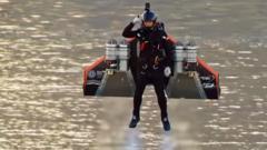 Jetman-in-jet-pack-and-wings-over-water-in-Dubai.