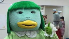 Leah in her mascot costume in Japan