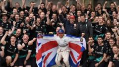 Lewis Hamilton with crew after winning the US Grand Prix