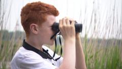 Finn with binoculars