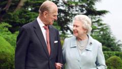Britain's Queen Elizabeth II and her husband, the Duke of Edinburgh walk at Broadlands, Hampshire in 2007