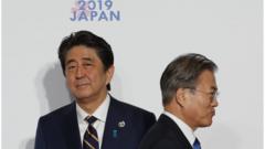 지난해 6월 오사카 G20 정상회담에서 아베 총리와 문재인 대통령