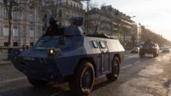 Armoured police vehicles by the Arc de Triomphe in Paris wait for anti-Covid demonstrations, 12 February 2022