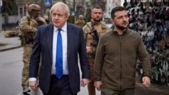 Ukraine"s President Volodymyr Zelenskiy and British Prime Minister Boris Johnson walk along a street after a meeting, as Russia"s attack on Ukraine continues, in Kyiv, Ukraine April 9, 2022.