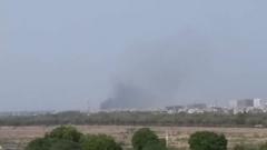 A picture from social media shows smoke billowing from the crash site