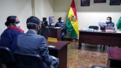People attend the hearing of former President Evo Morales' candidacy for a Senate at the Second Constitutional Chamber of La Paz, in La Paz, Bolivia, 07 September 2020.