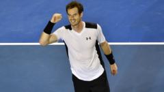 Andy Murray celebrates winning his quarter-final