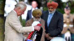 Britain"s Prince Charles lays a wreath at the VJ Day National Remembrance event,
