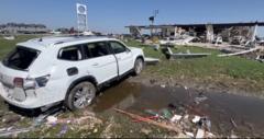 Millions of Americans under storm alerts after deadly tornadoes