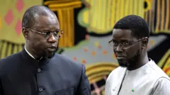Prime Minister Ousmane Sonko is pictured with President Bassirou Diomaye Faye 