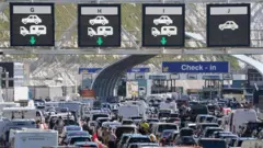 An overhead shot of queues of cars waiting at the check-in at the Port of Dover