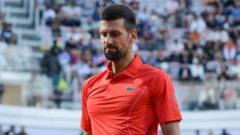 Djokovic out of Italian Open after defeat by Tabilo