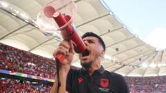 Albania’s Daku apologises for derogatory chants