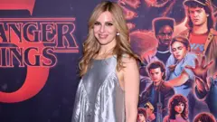 Getty Images Cara Buono attends Netflix's
