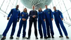 Mark Carney in a suit with five astronauts in blue overalls with a moon above them. 