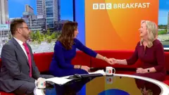 Carol Kirkwood with John Kay and Sally Nugent on BBC Breakfast