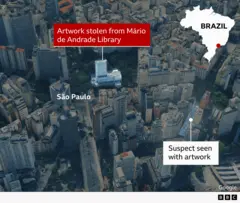 Map showing the location of the library, and some streets away, the location where one of the suspects was spotted. The aerial image shows a built-up area with many high-rise buildings.