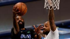 Irving stars as Mavericks beat Clippers to progress