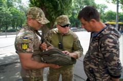 Conscription squads send Ukrainian men into hiding