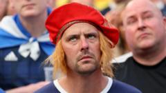 Scotland fans endure humbling Euro  opener against Germany