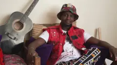 Kenyan Oasis fans Jeff Gachini