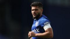 Ipswich captain Morsy signs new two-year deal