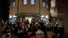 Sixteen arrested after police station protest