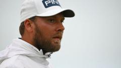 England's Brown leads Open as McIlroy toils at Troon