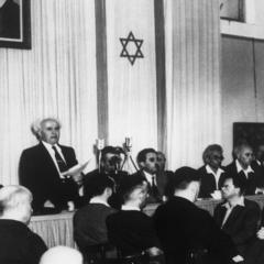 Prime Minister David Ben-Gurion reads the proclamation declaring the existence of the new Jewish State